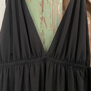 Beautiful long black dress. Slit on side. Worn once for special dinner.